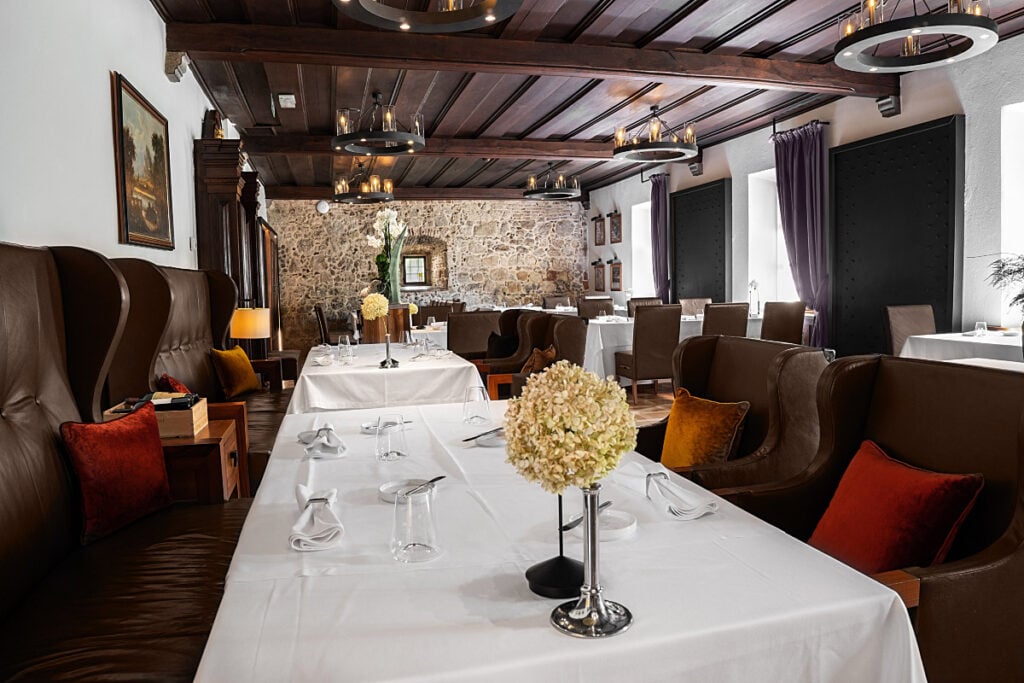 Elegant dining room at Restaurant Grad Otočec